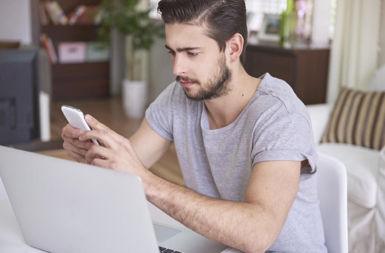 Financial analyst reviewing complex spreadsheet models with multiple scenarios
