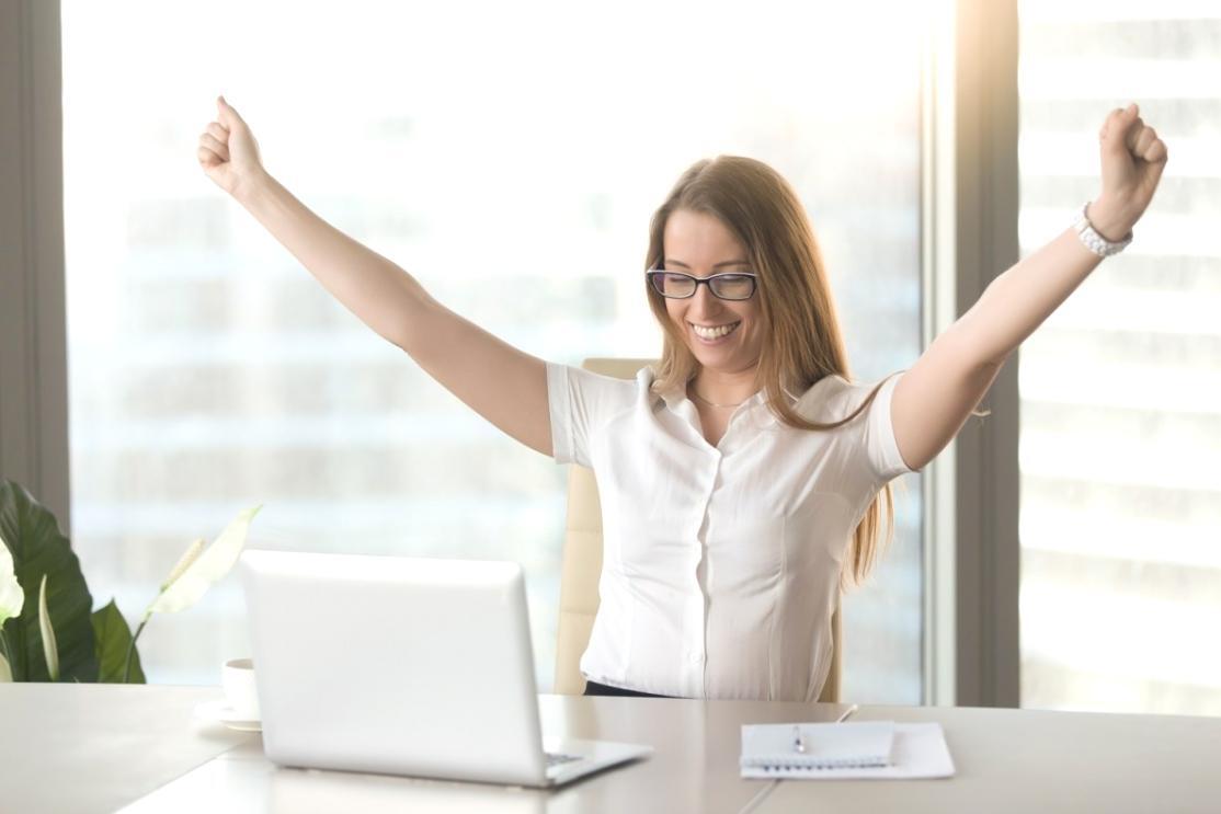 Financial analyst working with complex spreadsheet models and data visualization on multiple screens